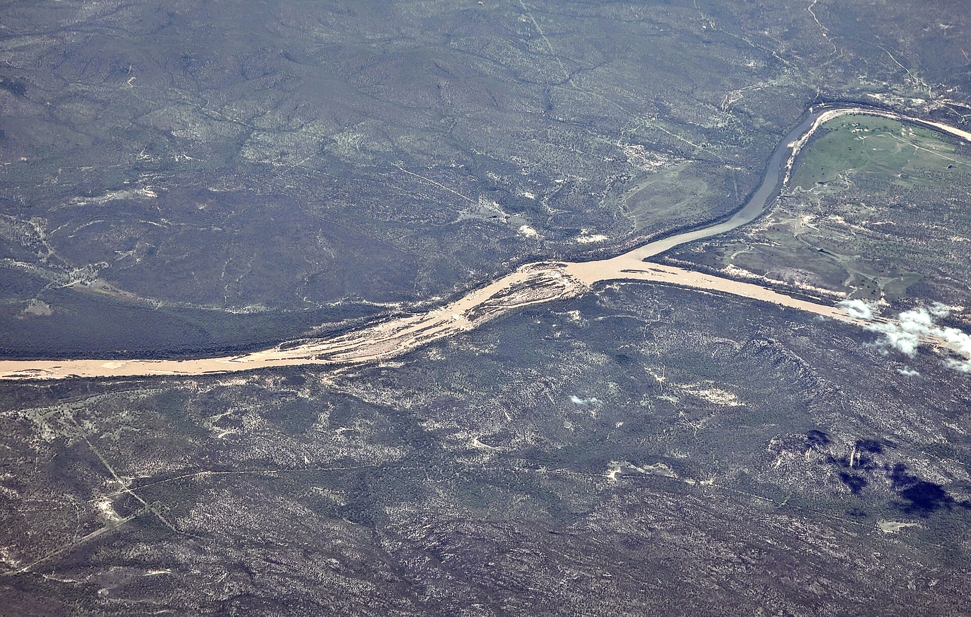 Aerial view of the Burdekin River in north Queensland: the wet-tropics catchment Bradfield wanted to tap, not a photograph of a built diversion