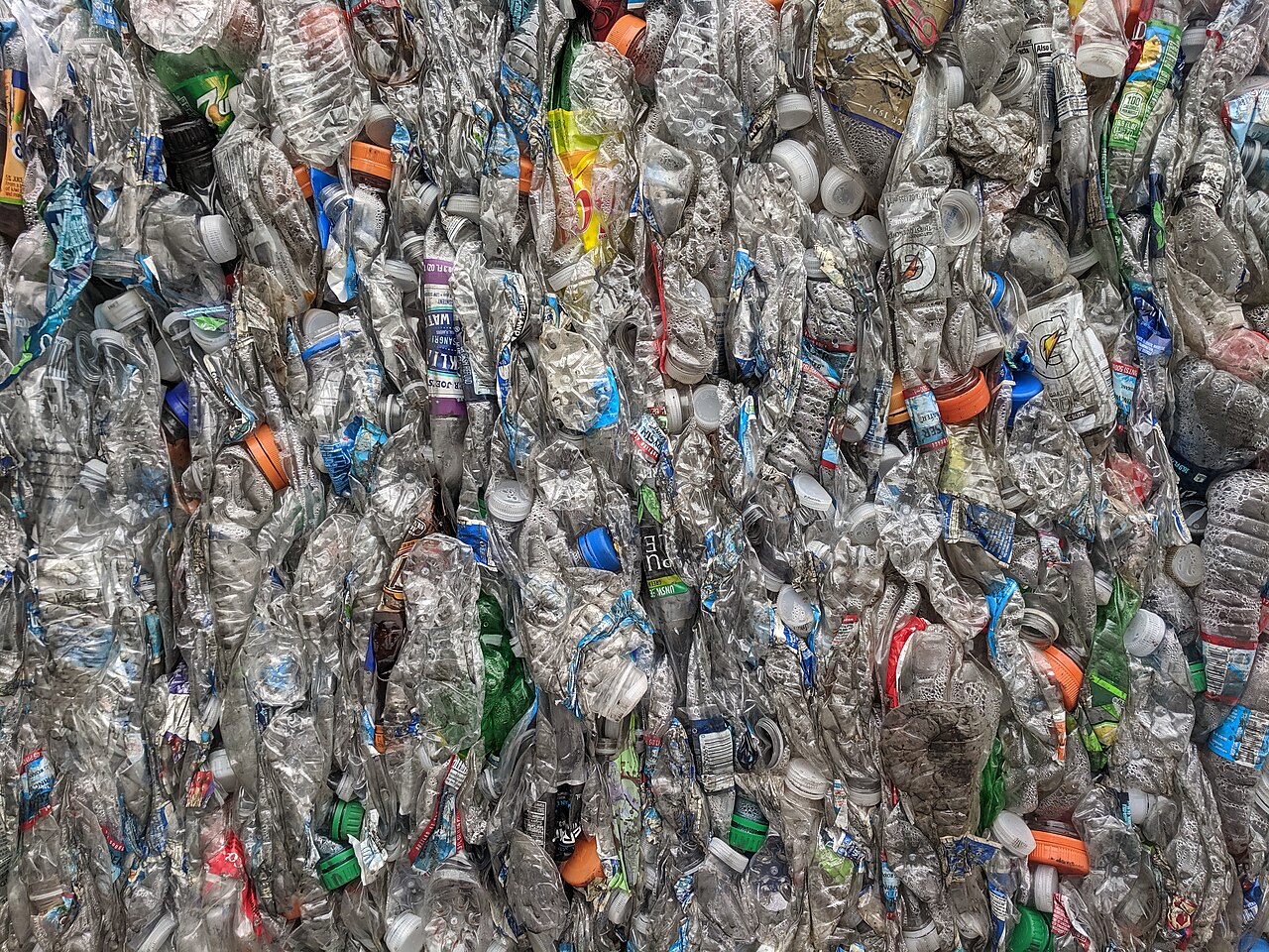 Bales of crushed PET bottles: the polyester feedstock enzymatic recyclers want to unzip