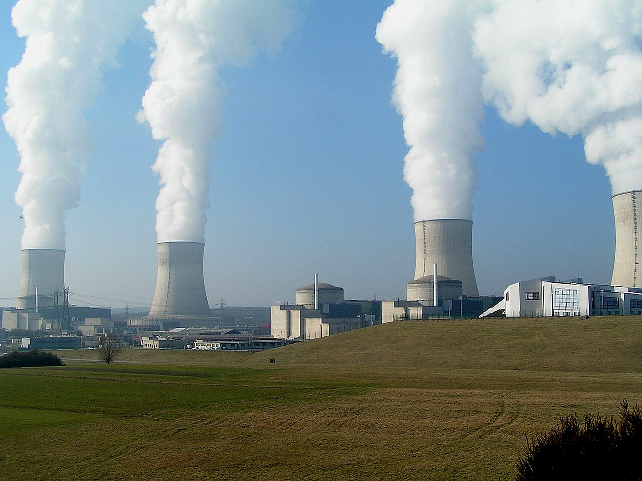 An operating nuclear power plant — context for modular fission, not a photograph of a specific SMR