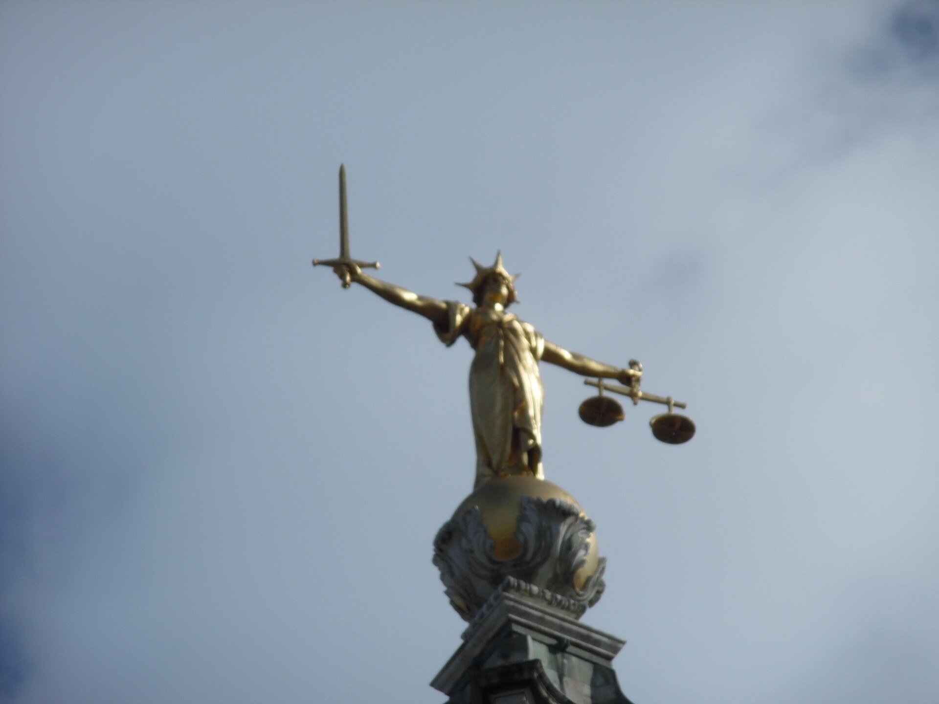 A statue of Justice, the usual emblem for civil claims