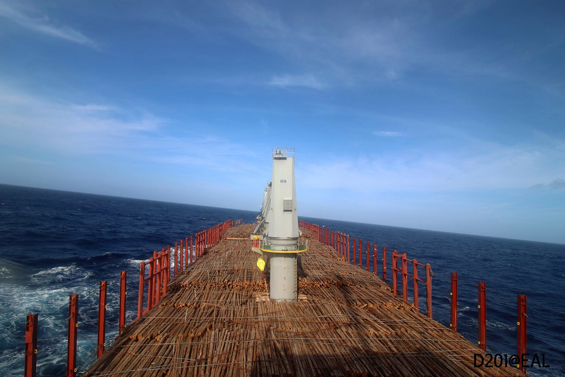Open water of the North Atlantic, seen from a vessel, with a distant ship on the horizon