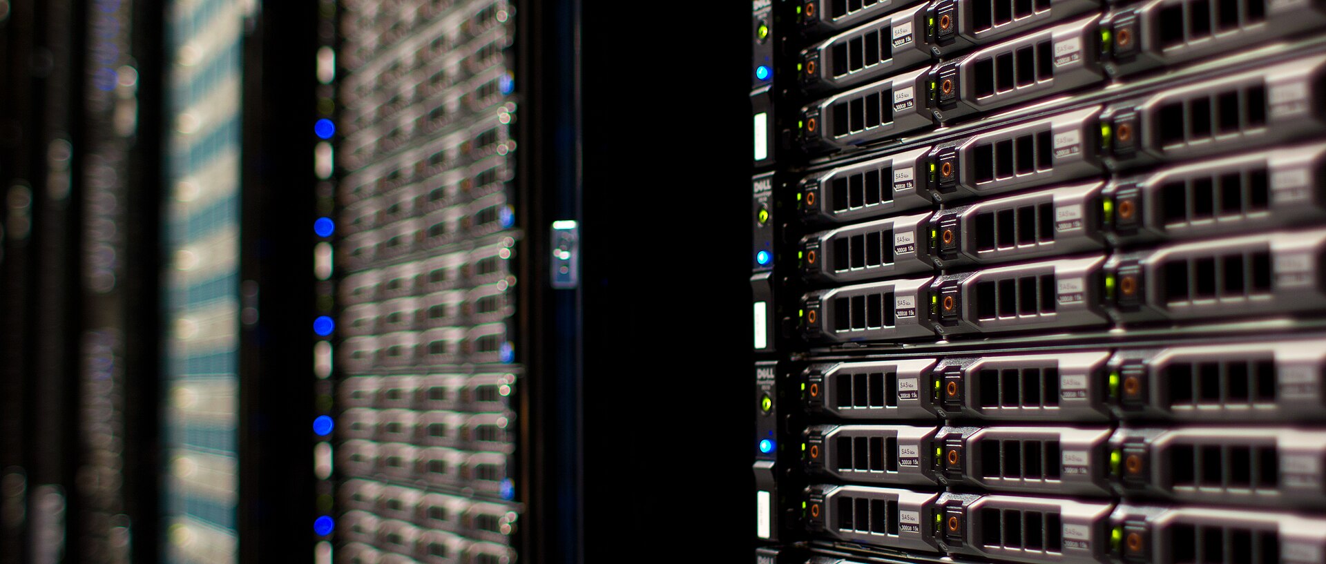 Rows of data-center servers, the industrial setting of large generative models