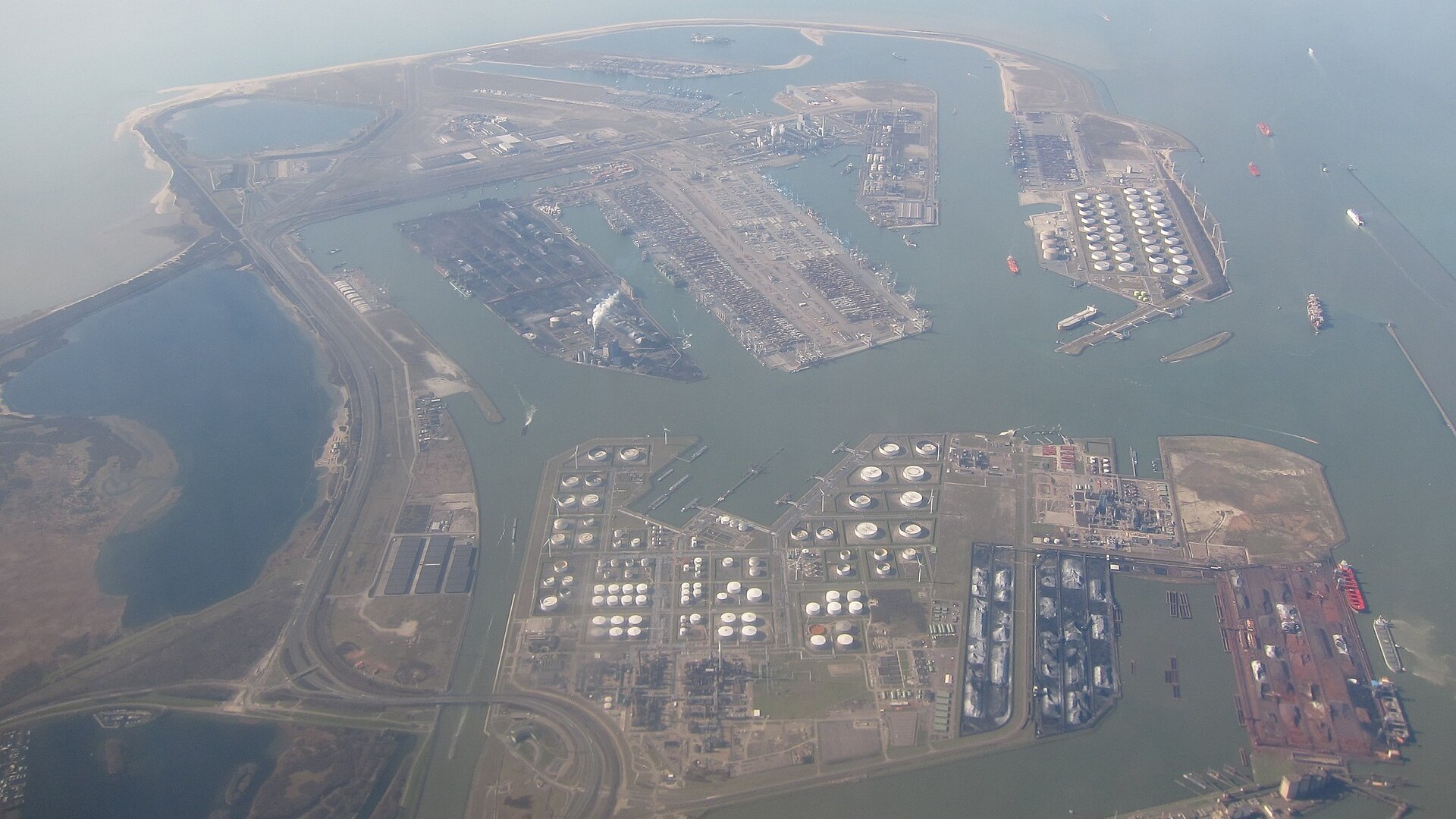 The port of Rotterdam from the air, in the city that gave its name to the prior informed consent convention on hazardous chemicals in trade.