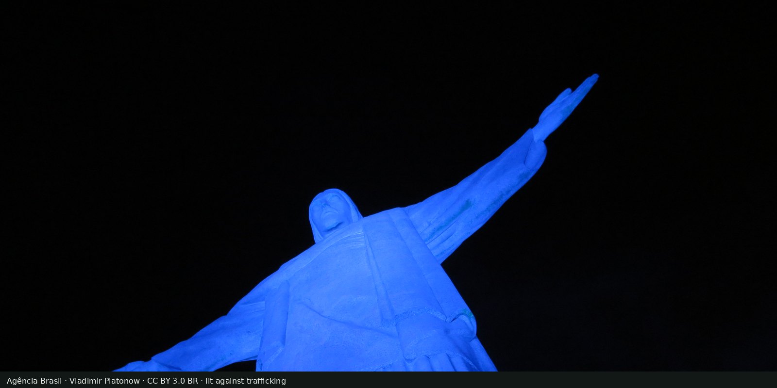 Christ the Redeemer in Rio de Janeiro lit blue against human trafficking. This photograph is not a UNODC GLOTIP report figure.