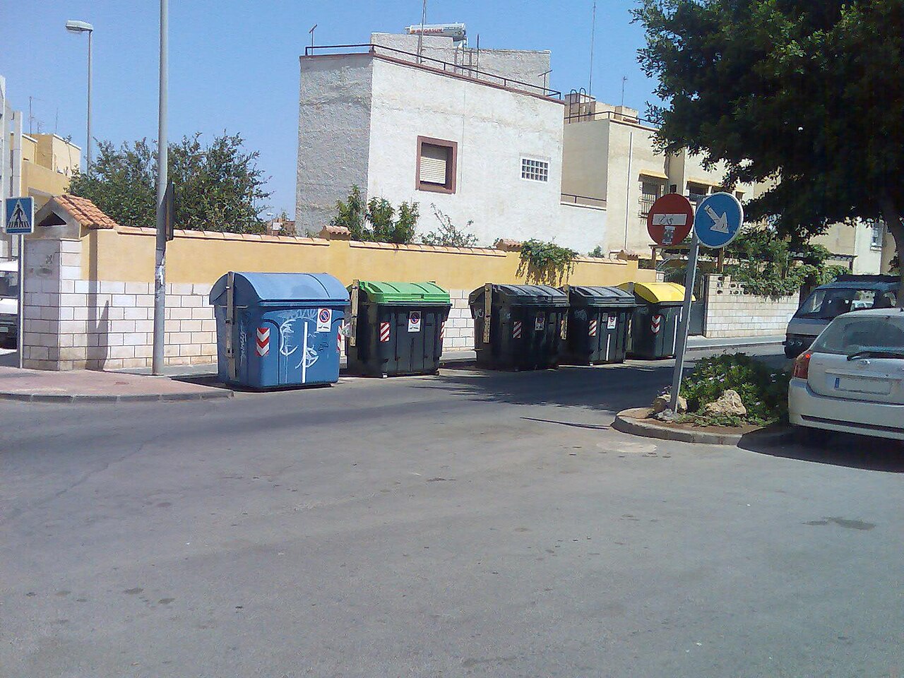 Recycling containers in Almería, Spain, for paper and cardboard, glass, organic waste and packaging, and plastic and metal.