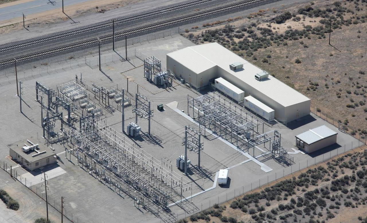 Overhead view of the Tehachapi Energy Storage Project: white battery halls beside a California substation