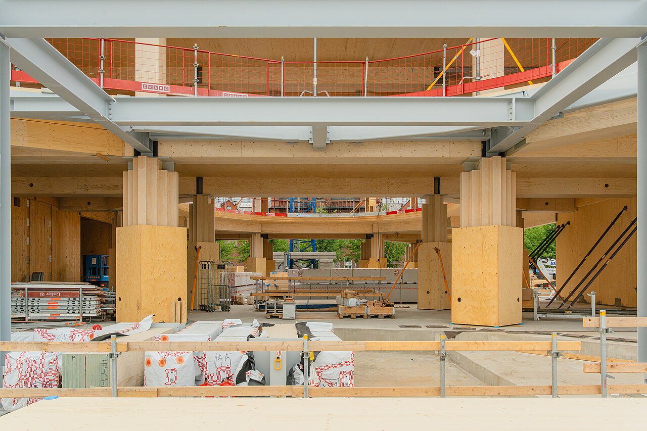 Mass-timber columns and beams of a mid-rise building under construction in Helsinki