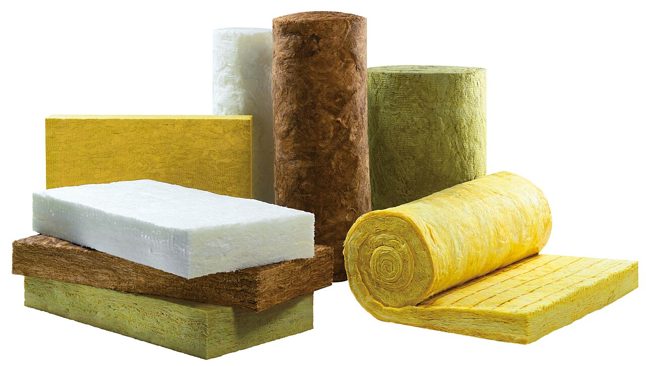 Mineral wool insulation boards and rolls in white, yellow, brown, and green