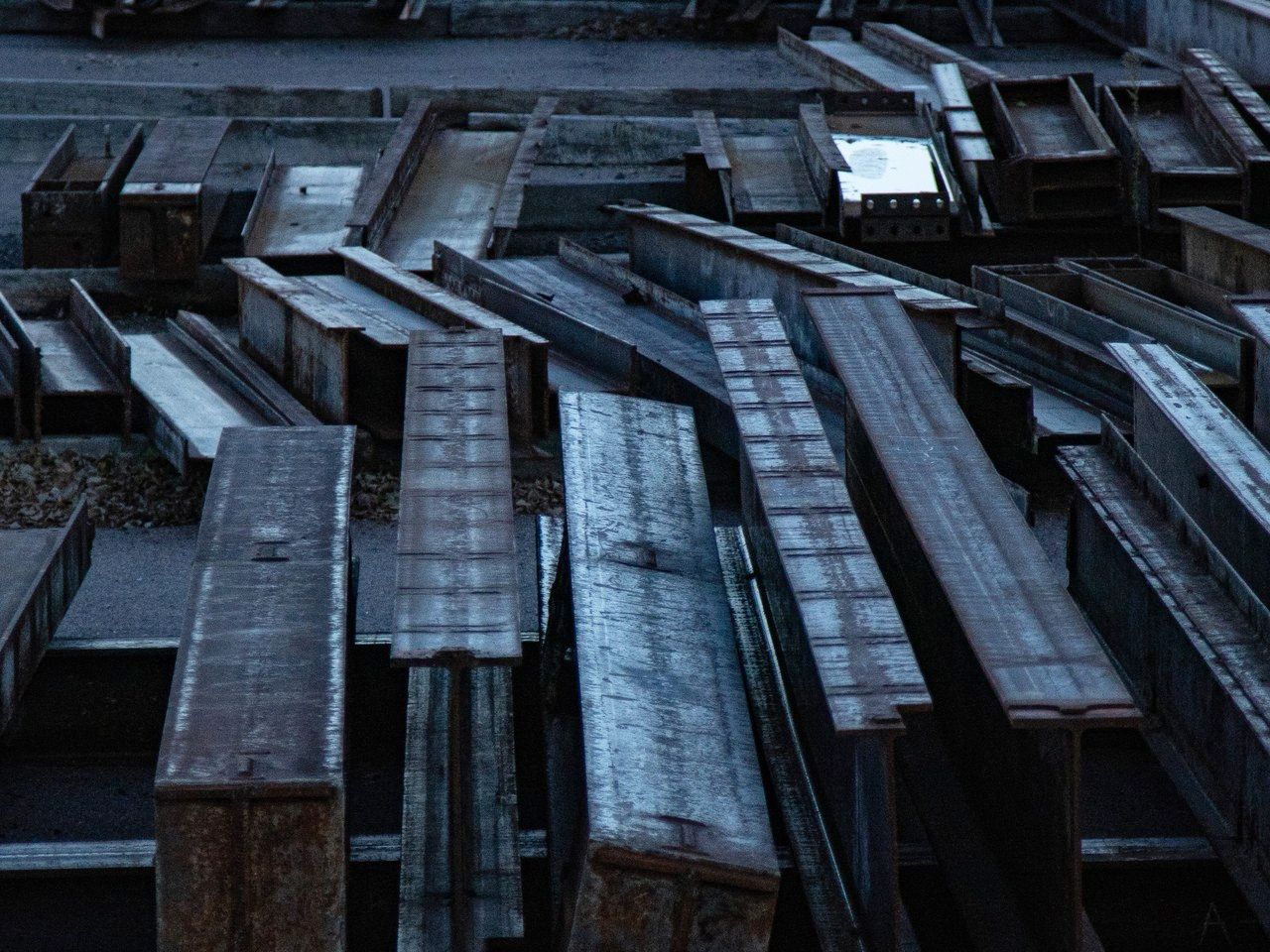 Steel beams salvaged from a deconstruction project in Boulder, Colorado, United States, stored for reuse.